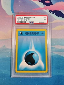 PSA 7 NM Water Energy - 1999 Pokemon Base Set 1st Edition 102/102 - Bild 1 von 2