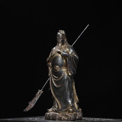 Ofrenda estatuas de bronce y oro de Guan Gong en casa Foto 1 de 4