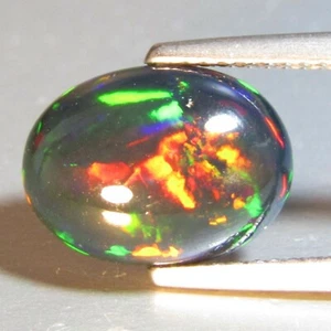 3.04Cts Natural Color Play Ethiopian Black Opal Oval Cabochon Loose Gemstone VOD - Picture 1 of 2