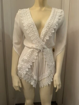 Mameluco manga 3/4 cuello en V detalle encaje A’Gaci talla pequeña. Blanco. Foto 1 de 4