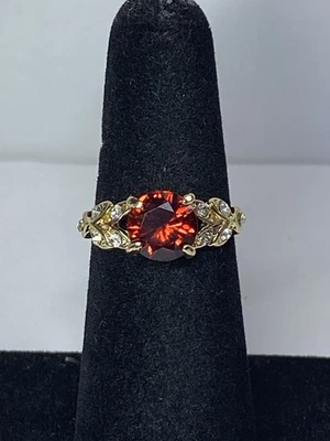 Round Sparkling Center Red Wine Ruby w/Clear Mini-Gemstones Gold-Tone RING 5.5 - Image 1 of 4