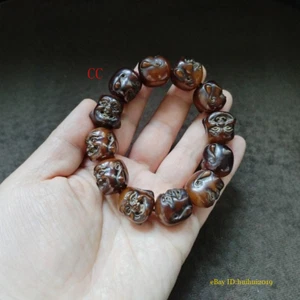 Bracciale cinese tibetano cera d'api che ride testa di Buddha vecchia patina preghiera perline - Foto 1 di 4