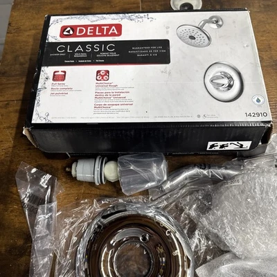 Delta Classic Grifo de ducha redondo de acero inoxidable de 1 manija con válvula de acero inoxidable 142910 Foto 1 de 4