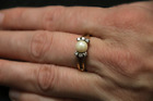 Złoty pierścionek 585-5,26gr, z perłą-6,57mm i 6 brylantami-0,12ct.