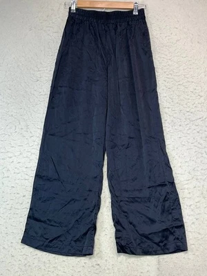 Pantalones ligeros Reformation negros de seda de pierna ancha cintura elástica para mujer talla 4  Foto 1 de 4