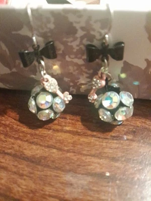 Cute Dangling Pierced Earrings With A Black Bow Pink Charm  And Round... - Image 1 of 4