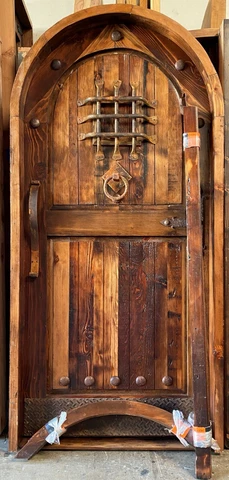 Rustic reclaimed lumber arched door solid wood storybook castle winery speakeasy Cover