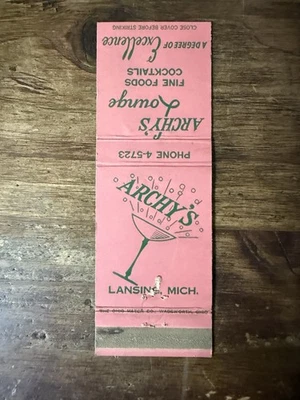Cubierta de libro de cerillas vintage D983 Archy’s Lounge comida cócteles Lansing Michigan Foto 1 de 2