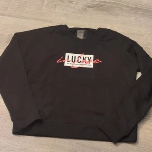 Lucky in love pullover black sweatshirt size XS - Picture 1 of 8