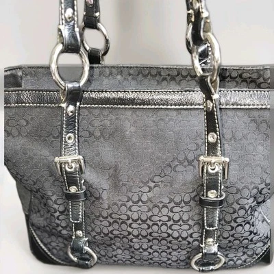 Bolso de Mano Coach Signature Jacquard Negro con Borde de Cuero y Herrajes Plateados Foto 1 de 4