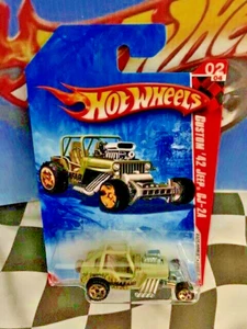 Hot Wheels 2010 Race World Jungle 2/4 214 1942 Custom '42 Jeep CJ-24 Khaki - Picture 1 of 1