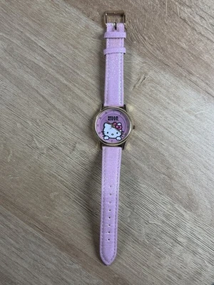 Reloj de pulsera Accutime Sanrio Hello Kitty rosa y dorado correa brillante FUNCIONA Foto 1 de 4