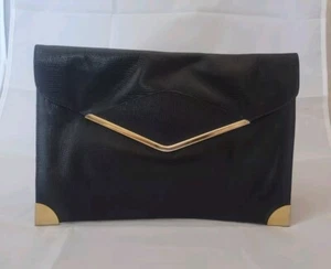 Bolso sin asas vintage de cuero suave negro dorado Phillippe con clase  - Imagen 1 de 7