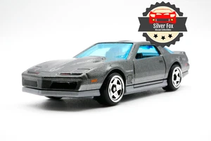 Pontiac Firebird 1984 transmisión automática gris oscuro escala 1/64 diecast modelo de coche de coleccionista - Imagen 1 de 10