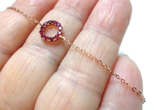 14K Rotgold, 585 gestempelt, R signiert, 0,222 ct, Rubine Halo Armband, 0,8 Gramm. - Bild 1 von 8