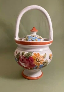 Markenloses handbemaltes Keramikglas mit Deckel & Korbgriff aus Italien - Bild 1 von 6