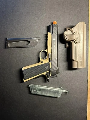 Pistola de Airsoft Elite Force 1911 Tac CO2 GBB con 1 cargador, cargador de velocidad y funda Foto 1 de 4
