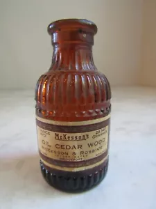 Vintage McKesson's Oil Cedar Wood Brown Fluted Glass Bottle 1 oz - Picture 1 of 4