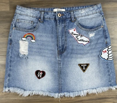 Falda vaquera de algodón azul Forever 21 para mujer adolescente con parches talla 29 Foto 1 de 4
