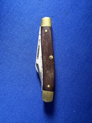 Cuchillo FRONTIER de Imperial Double Eagle 4135 madera y latón hecho en EE. UU. Foto 1 de 4