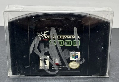 Cartucho autografiado Wrestle Mania 2000 Nintendo 64 azul Meanie raro Foto 1 de 4