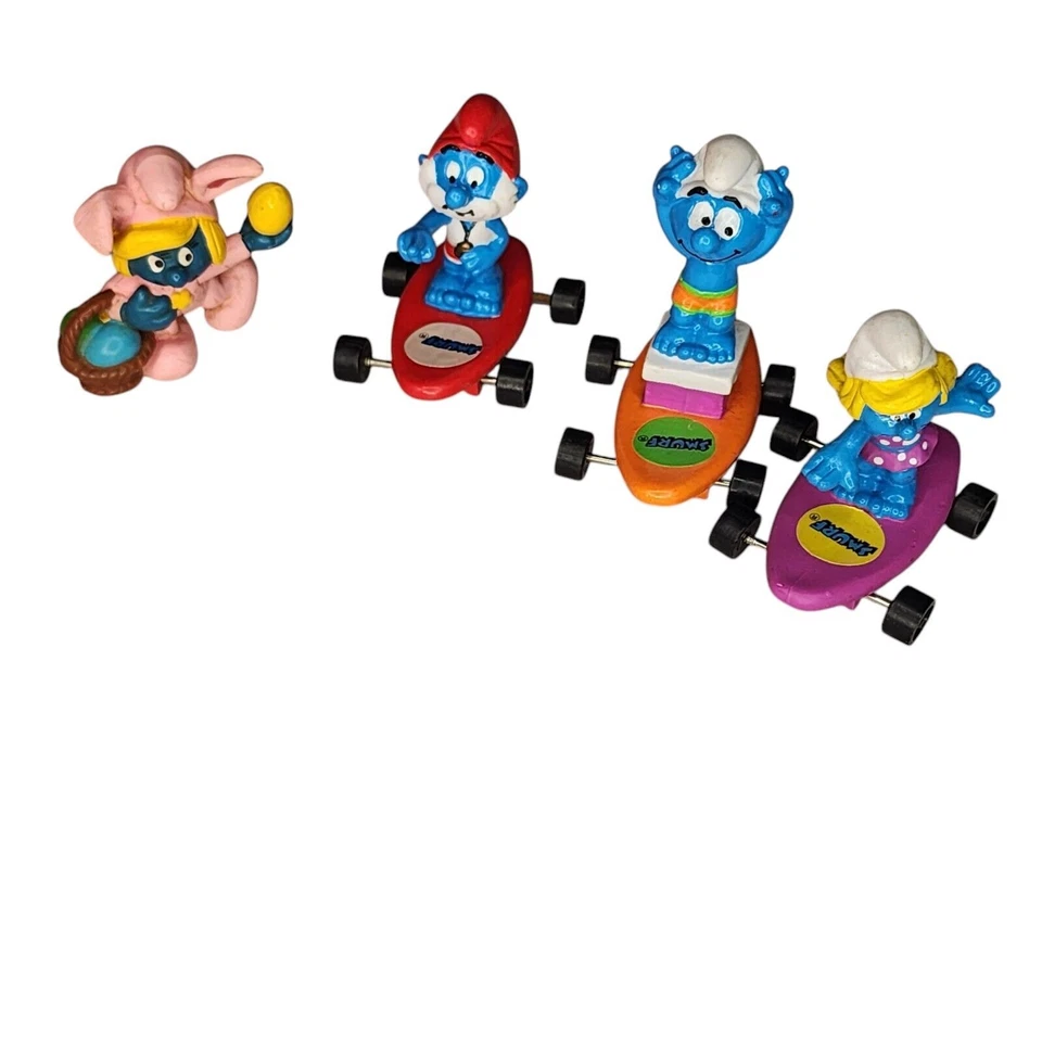Lote de 4 figuras de PVC de colección Hardees 1990 Peyo Applause SMURFIN SMURFS monopatín Foto 1 de 4