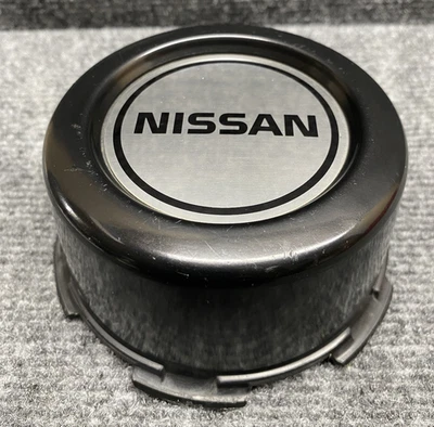 Llanta de acero Nissan Hardbody D21 Pathfinder 1987-1997 tapa central de plástico ¡OEM! Foto 1 de 4