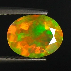 1.29 Cts Flashing Oval (9 x 7 mm) Ribbon Mackerel pattern Solid Welo Opal - Foto 1 di 6