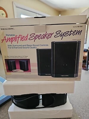 Sistema de altavoces amplificado portátil realista. Plumín Foto 1 de 2