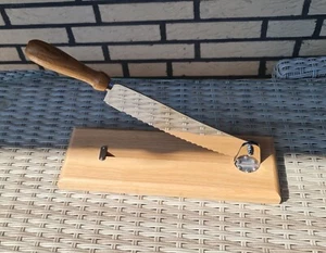 Brotschneider mit Holzplatte, Klinge 23 cm Edelstahl und Naturholz neuwertig - Bild 1 von 2