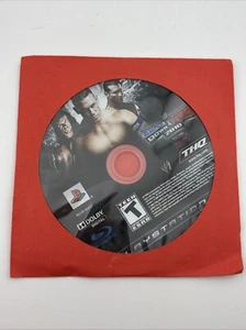 WWE SmackDown vs. Videojuego Raw 2010 (PlayStation 3, 2009) solo disco probado - Imagen 1 de 3