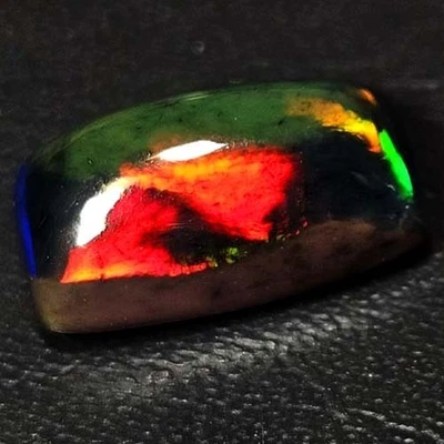 NATURAL AAA+SUPERIOR COLORPLAY FANCY CABOCHAN  ETHIOPIAN WELO BLACK OPAL 2.25CTS - Image 1 of 3