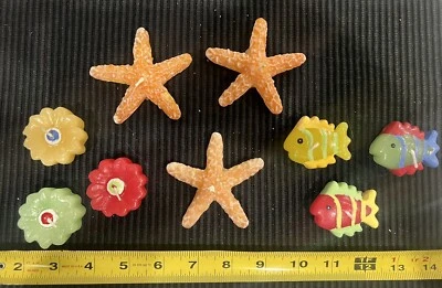 Lote de 9 velas flotantes temáticas de playa - estrellas de mar flores peces Foto 1 de 4