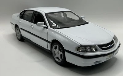 WELLY 2001  CHEVROLET IMPALA   1:24 SCALE WHITE RARE RARE FIND NEW - Image 1 of 4