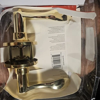 Cajas fuertes y cerraduras de puerta Honeywell 8106002 palanca de puerta de privacidad ondulada, latón pulido OB Foto 1 de 2