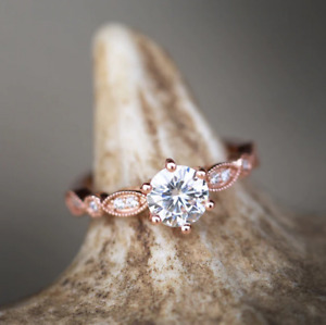 Gorgeous Prong Set 0.56CT Vivid White Moissanite In 10K Rose Gold Solitaire Ring