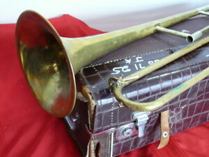 King Trombone for parts. Requires service.  Missing mouthpiece.
