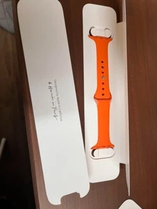 Apple Watch Hermès pomarańczowy pasek 42mm stylowy trwały design autentyczny używany - Zdjęcie 1 z 3