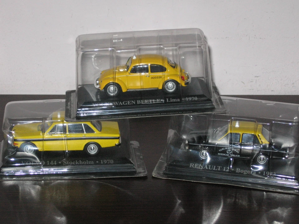 LOTTO 3 TAXI  VOLVO 144 STOCCOLMA RENAULT 12 BOGOTA' VOLKSWAGEN BEETLE LIMA 1:43 - Immagine 1 di 1