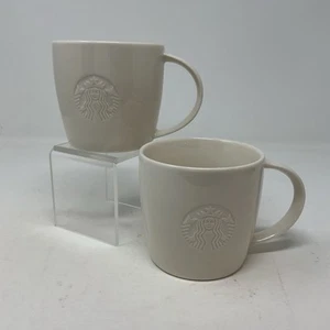 Starbucks 2010 White Embossed Mermaid Siren T Handle Coffee Mug Cup Set Of 2 - Picture 1 of 14