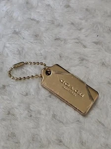 Coach dicker kleiner goldfarbener Messing Metall Taschenanhänger Schlüsselanhänger Anhänger 2" kurze Kette - Bild 1 von 6