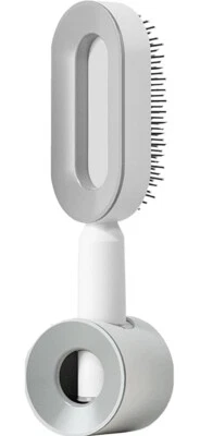 Cepillo de pelo con soporte Foto 1 de 4