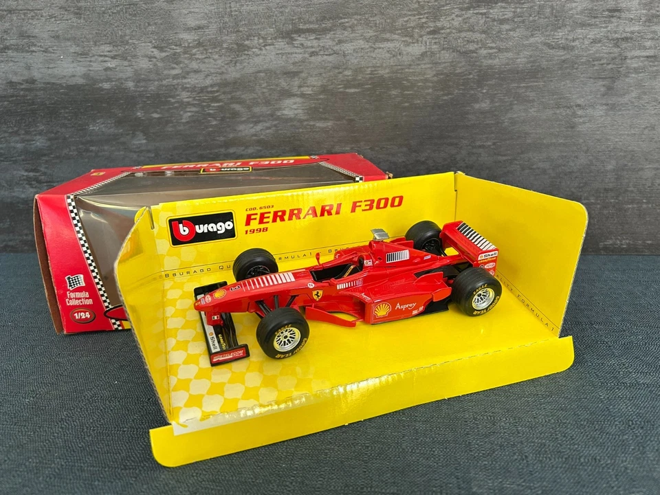 FERRARI F300 1998 FORMULA 1 MICHAEL SCHUMACHER Formula Collection 1/24 BBURAGO - Immagine 1 di 4