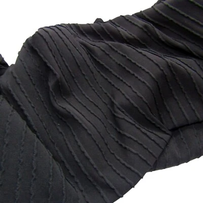 Tela tejida de algodón con textura negra Foto 1 de 2