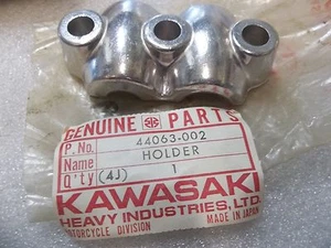 KAWASAKI FRONT AXLE HOLDER F7 G3 1970-1975 NOS/OEM 44063-002 - Bild 1 von 1