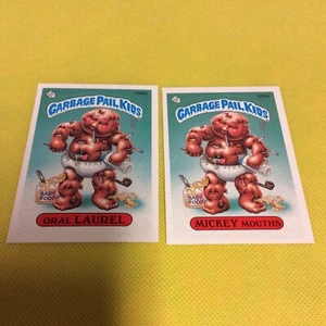 Topps Garbage Pail Kids Series 7 Mickey Mouths 258a 1987 y Oral Laurel 258b como nuevo - Imagen 1 de 7