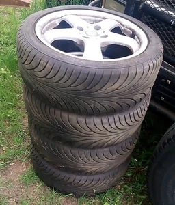 (4) 205/50/17 Sport Edition 4x4.5 Wheels Rims Tires Center Caps set of used - Picture 1 of 8
