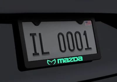 Marco de matrícula de acero inoxidable brillante con logotipo de Mazda devil libre de óxido Foto 1 de 2