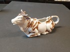Antique Brown And White Sitting Bull Creamer