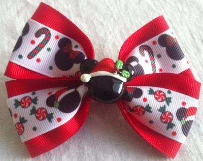 Moño de pelo para niñas de 4" de ancho bastón de caramelo de Navidad rojo Minnie Santa sombrero respaldo plano  Foto 1 de 4